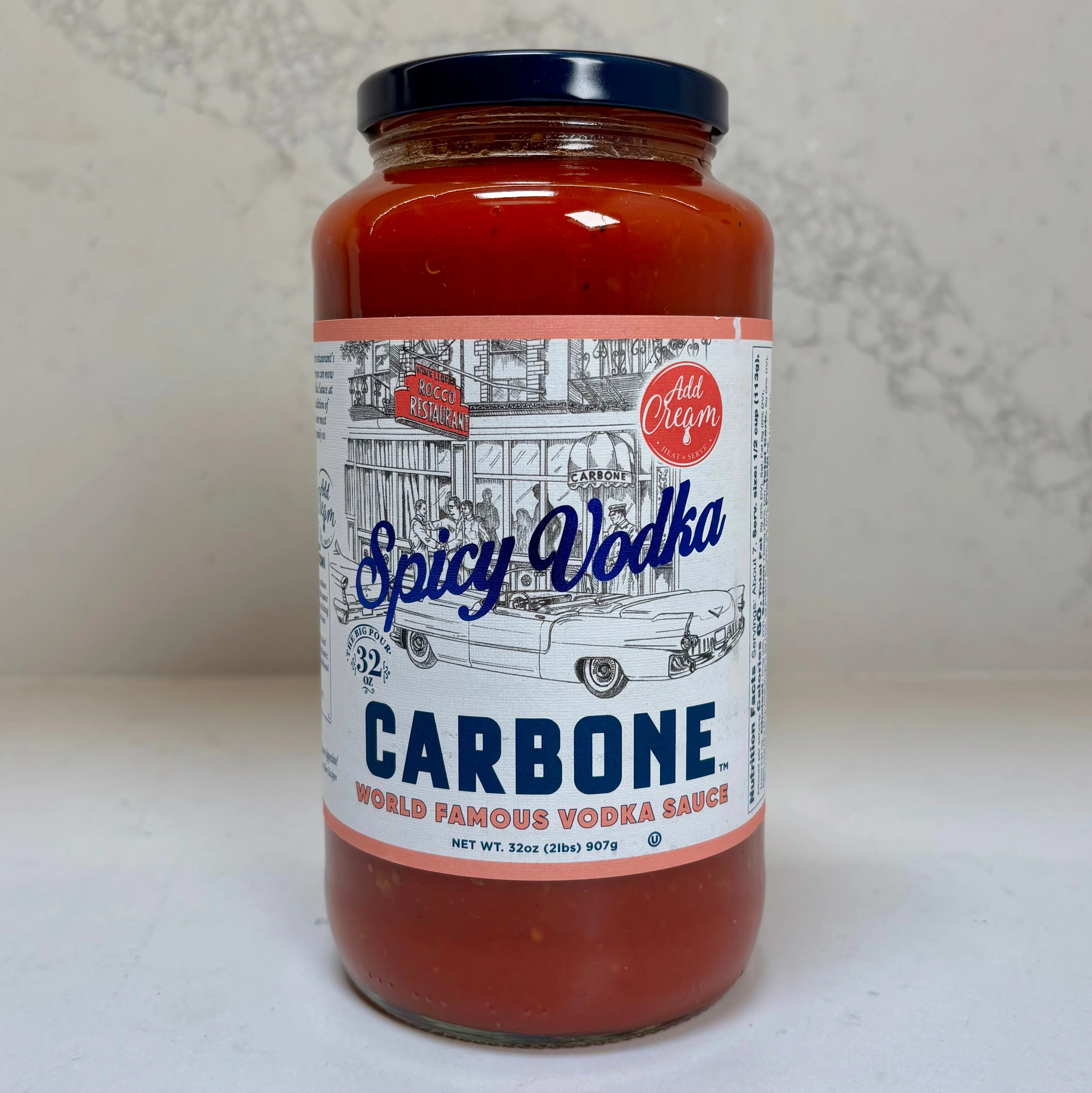 Jar of Carbone's Spicy Vodka Sauce.